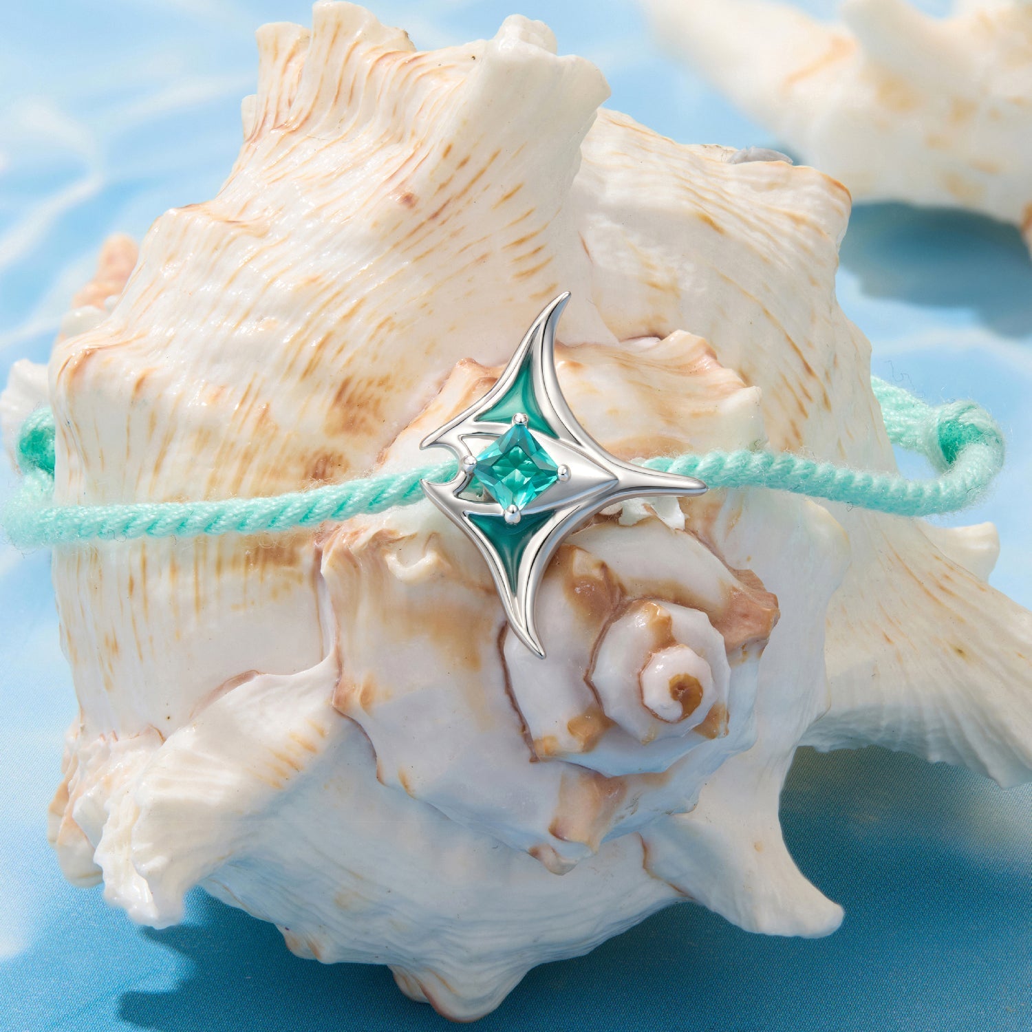 Bracelet: 925 silver adjustable teal enamel starburst pendant with glass centerpiece on mint cord on Tampa Home & Garden Store