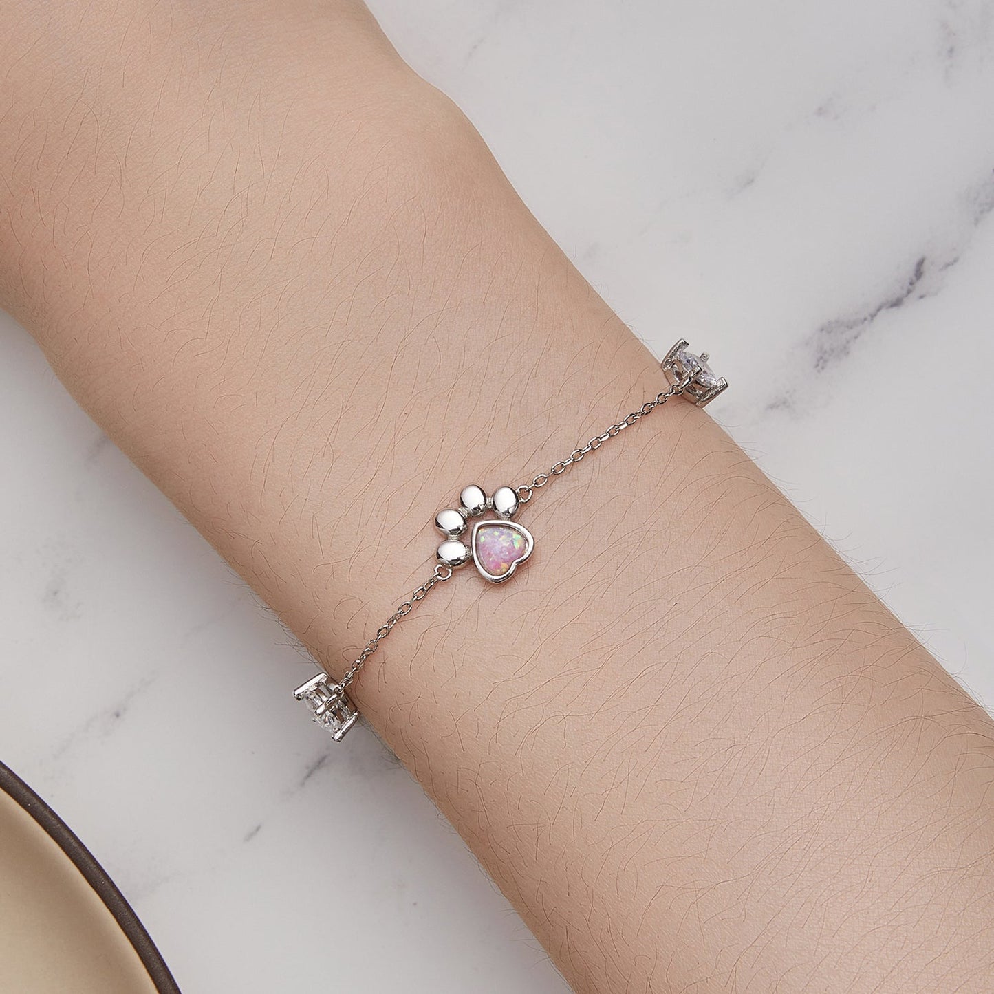 Bracelets: 925 silver opal heart with paw charm on a chain on wrist on Tampa Home & Garden Store