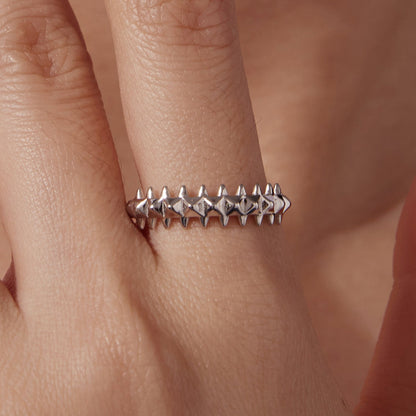Sterling silver ring with white gold plating featuring a spiked band for women on Tampa Home & Garden Store