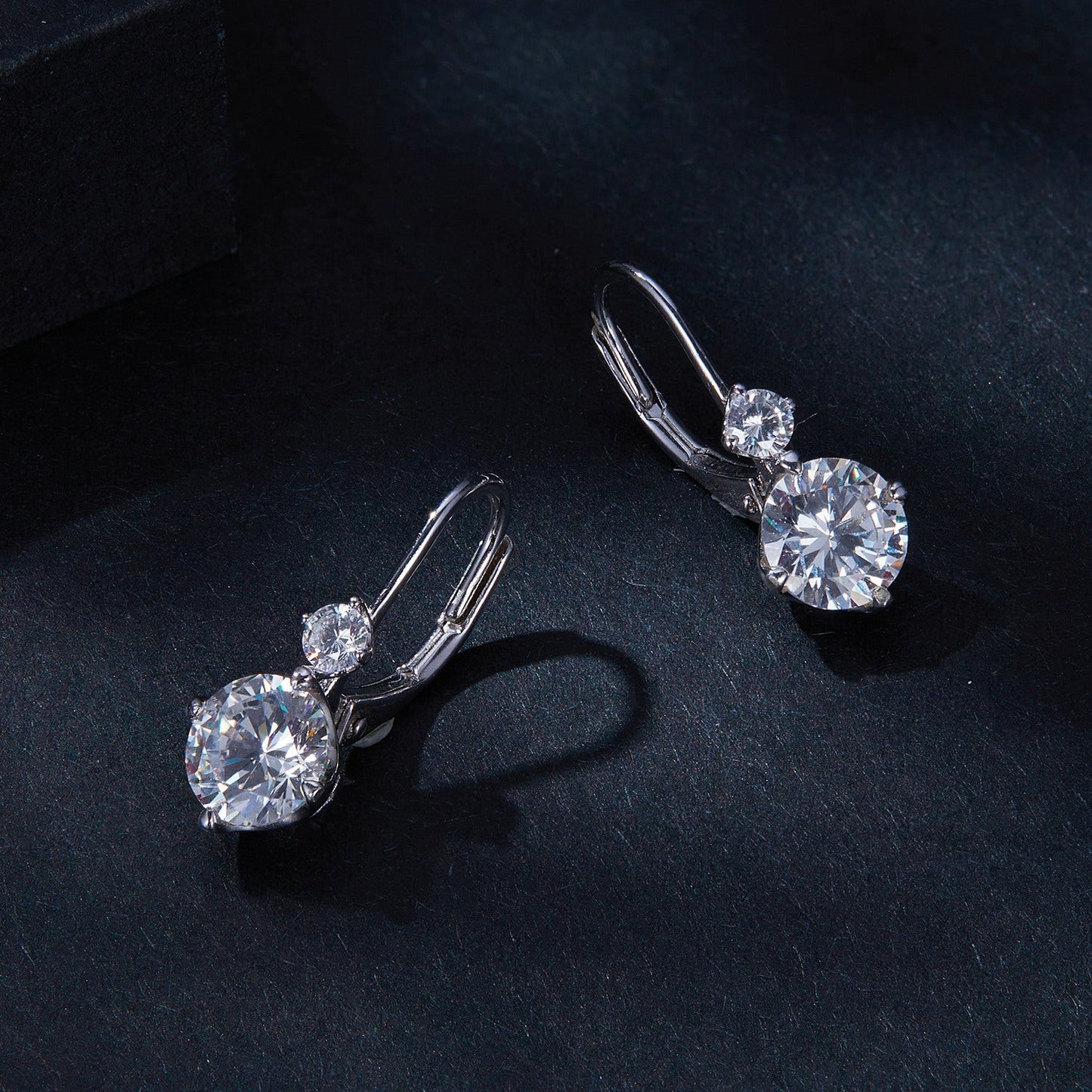 Pair of sterling silver moissanite earrings with pavé setting, 6.5mm main stone, by Bids.com on Tampa Home & Garden Store
