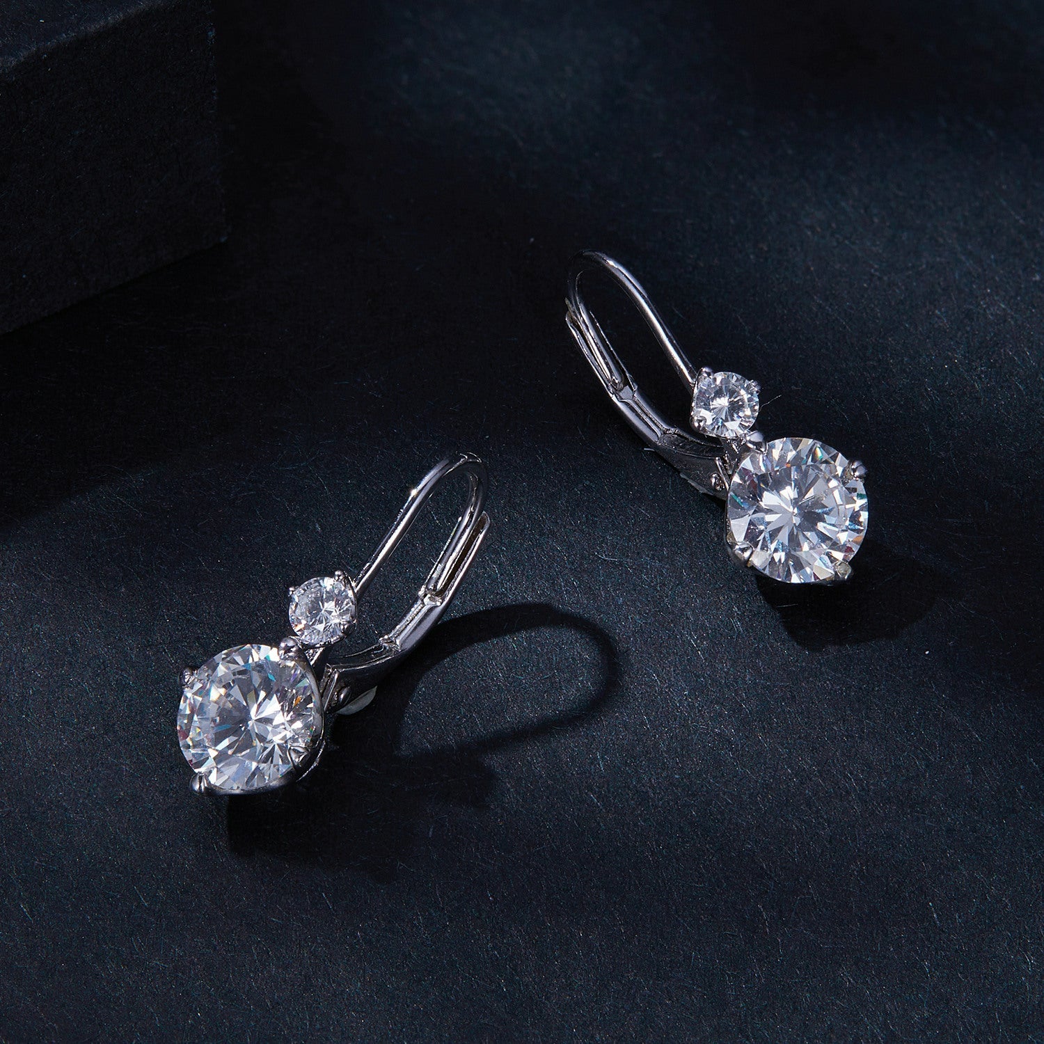 Pair of sterling silver moissanite earrings with pavé setting, 6.5mm main stone, by Bids.com on Tampa Home & Garden Store