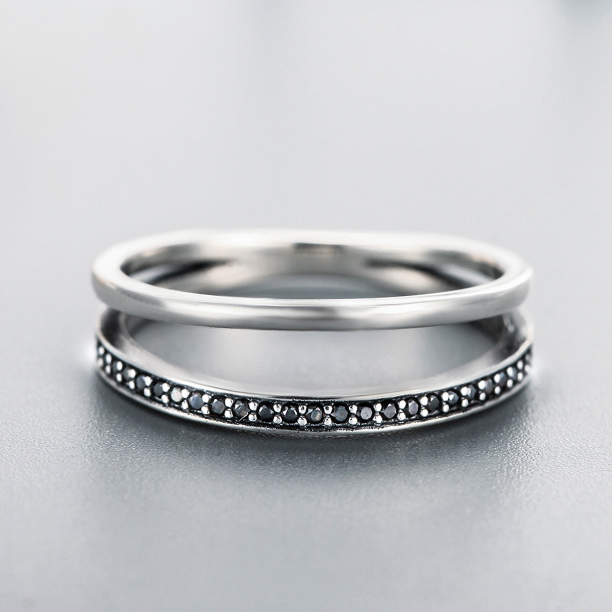 Sterling silver rings set: 0.6 cm wide plain and pavé beaded bands, women's size 6, two rings on Tampa Home & Garden Store