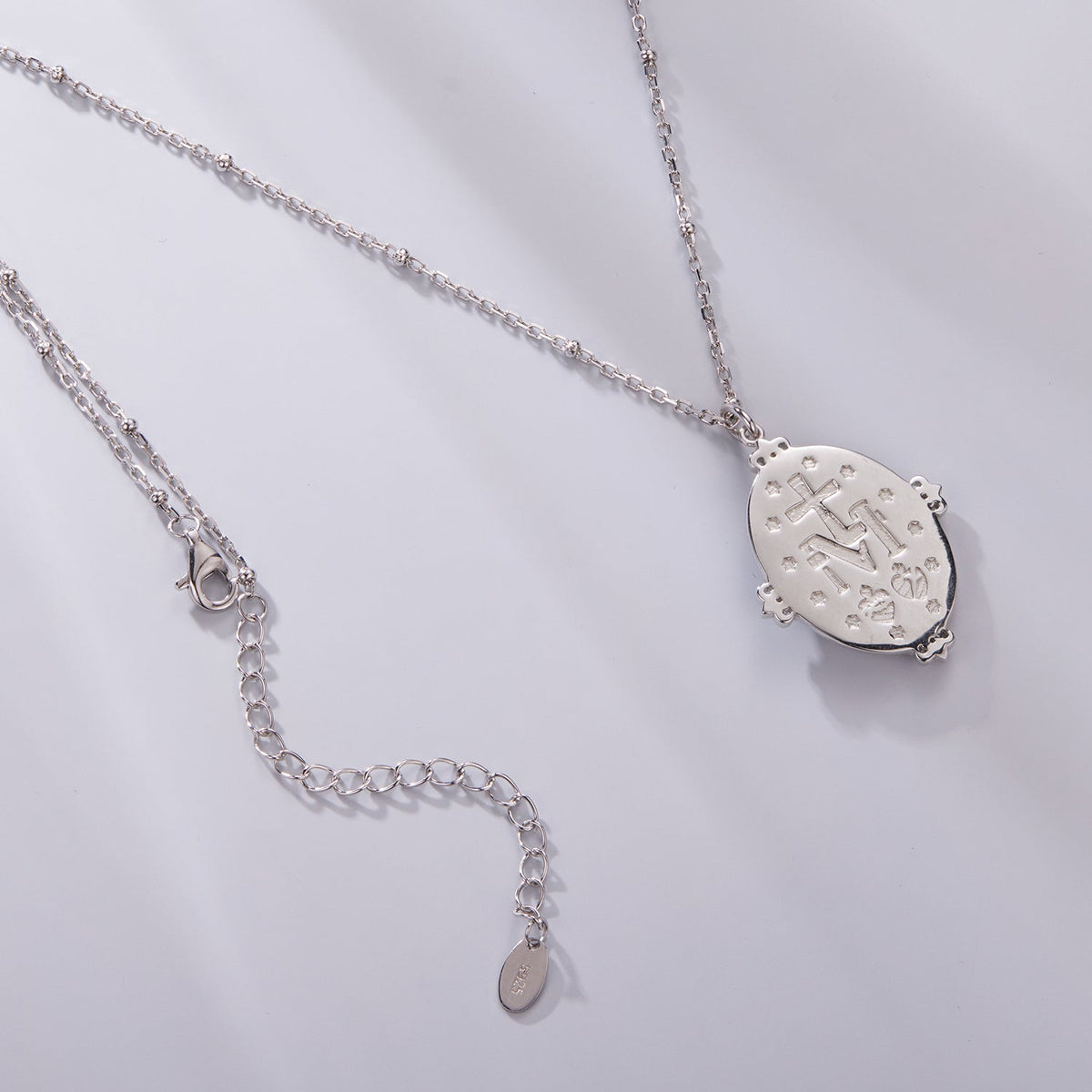 Sterling silver necklace with white gold plating, 40+5cm chain, oval pendant with cross cutouts on Tampa Home & Garden Store