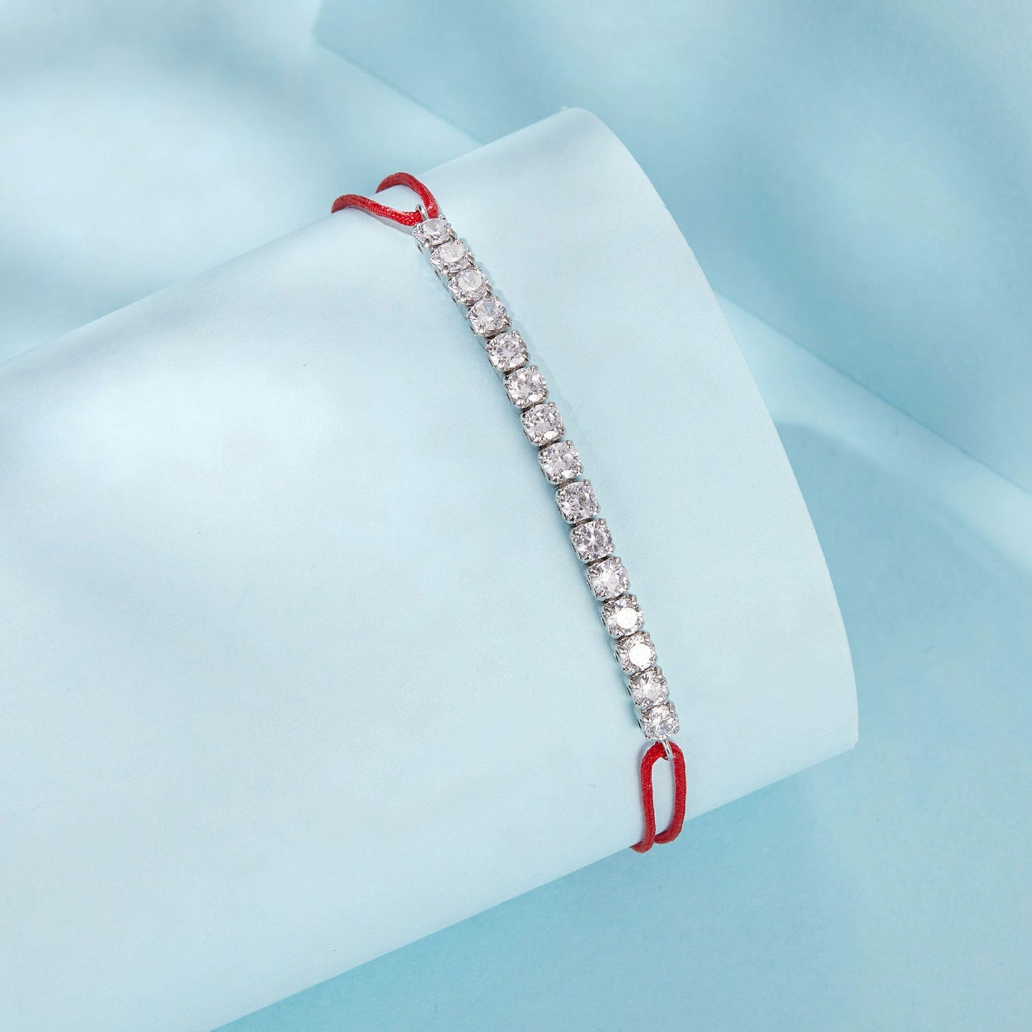 925 Sterling Silver Adjustable White Gold Plated CZ Bracelet by Bids.com with red cord on Tampa Home & Garden Store