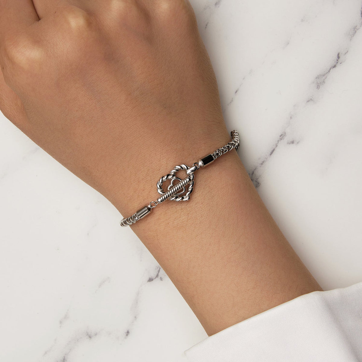 Bracelet, sterling silver 3.0mm plated platinum, rope chain with heart knot, size 17 on Tampa Home & Garden Store