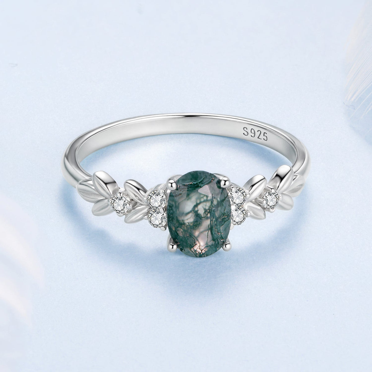 Sterling silver ring with oval green agate center stone and surrounding CZ stones, size 6 by Bids.com on Tampa Home & Garden Store