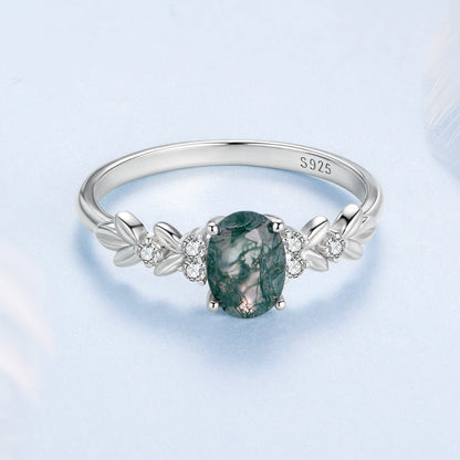 Sterling silver ring with oval green agate center stone and surrounding CZ stones, size 6 by Bids.com on Tampa Home & Garden Store