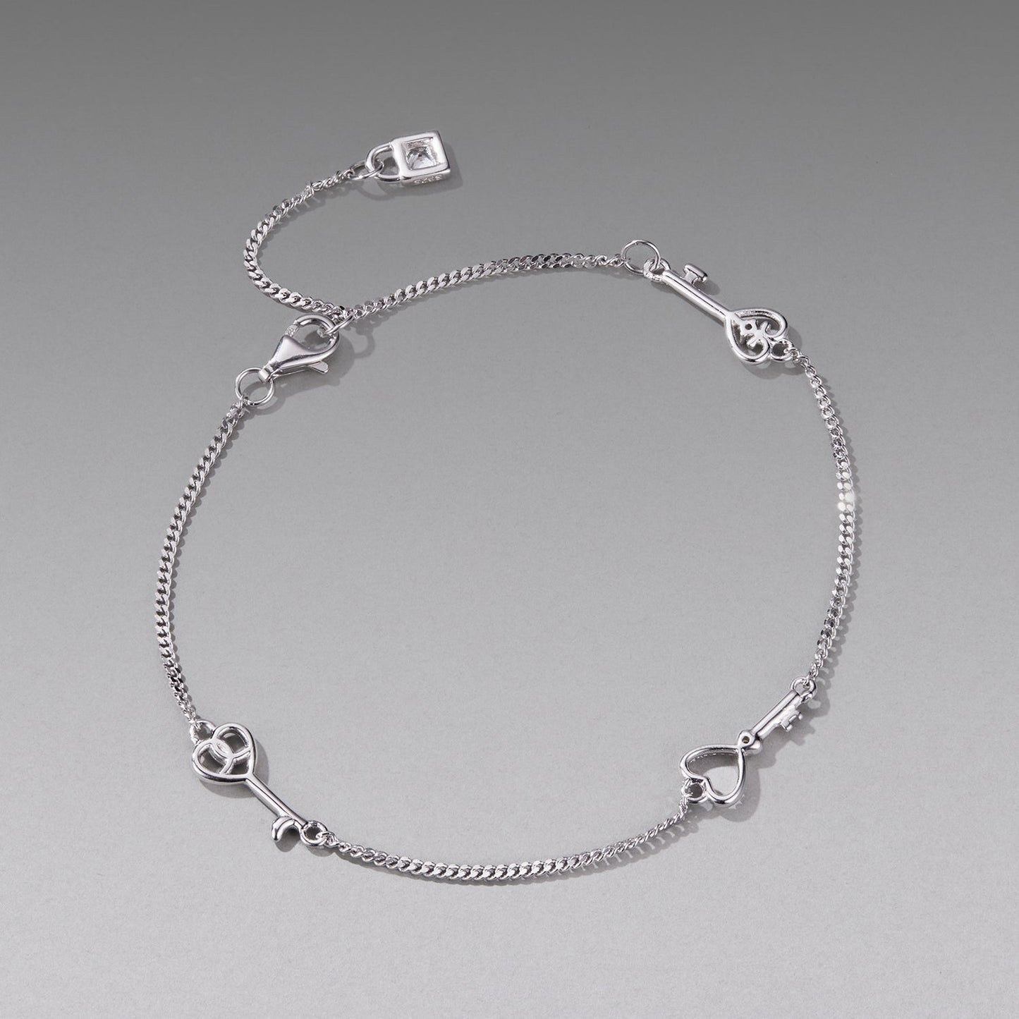 Bracelet 925 Sterling Silver White Gold Plated 21cm pavé CZ with heart & key charms Bids.com on Tampa Home & Garden Store
