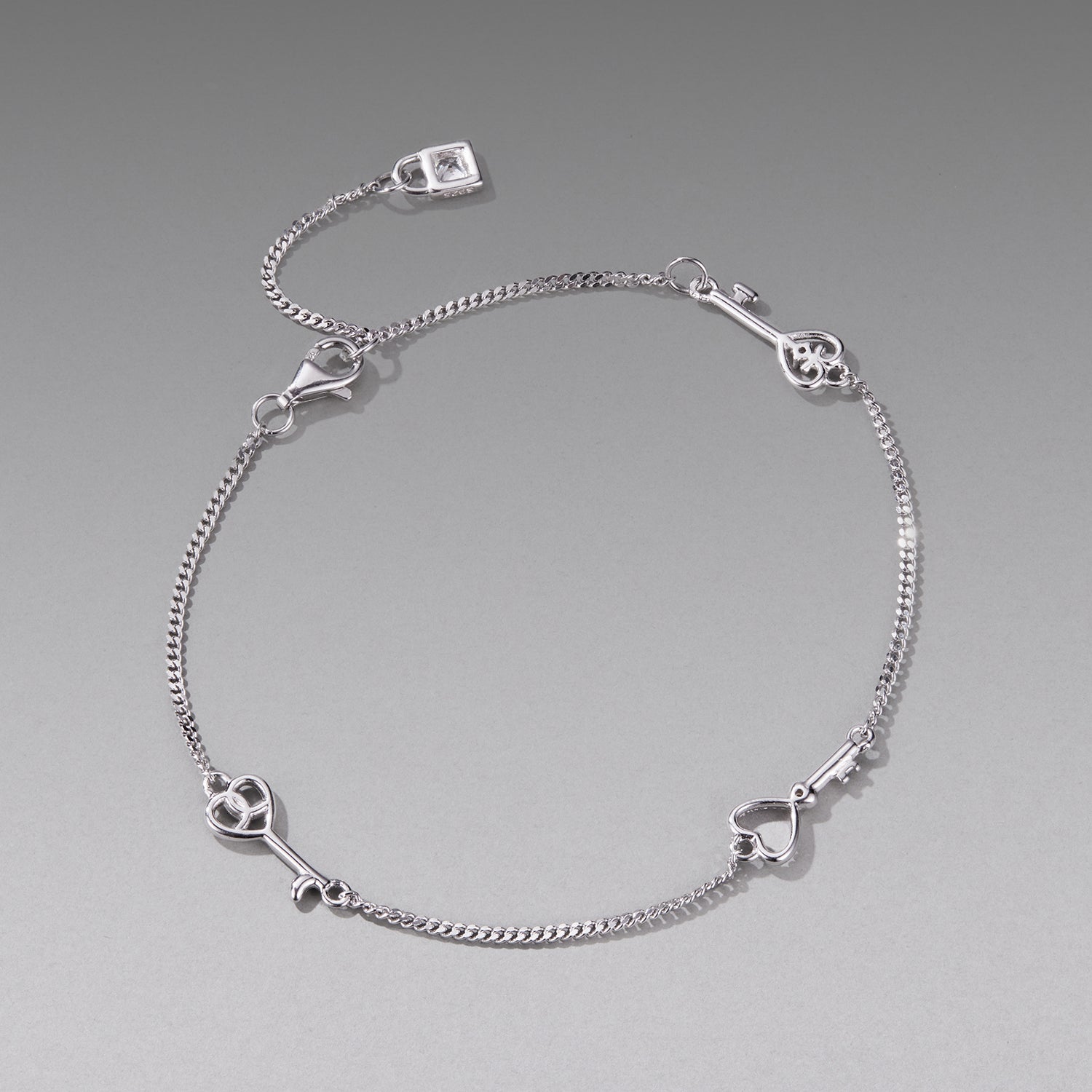 Bracelet 925 Sterling Silver White Gold Plated 21cm pavé CZ with heart & key charms Bids.com on Tampa Home & Garden Store