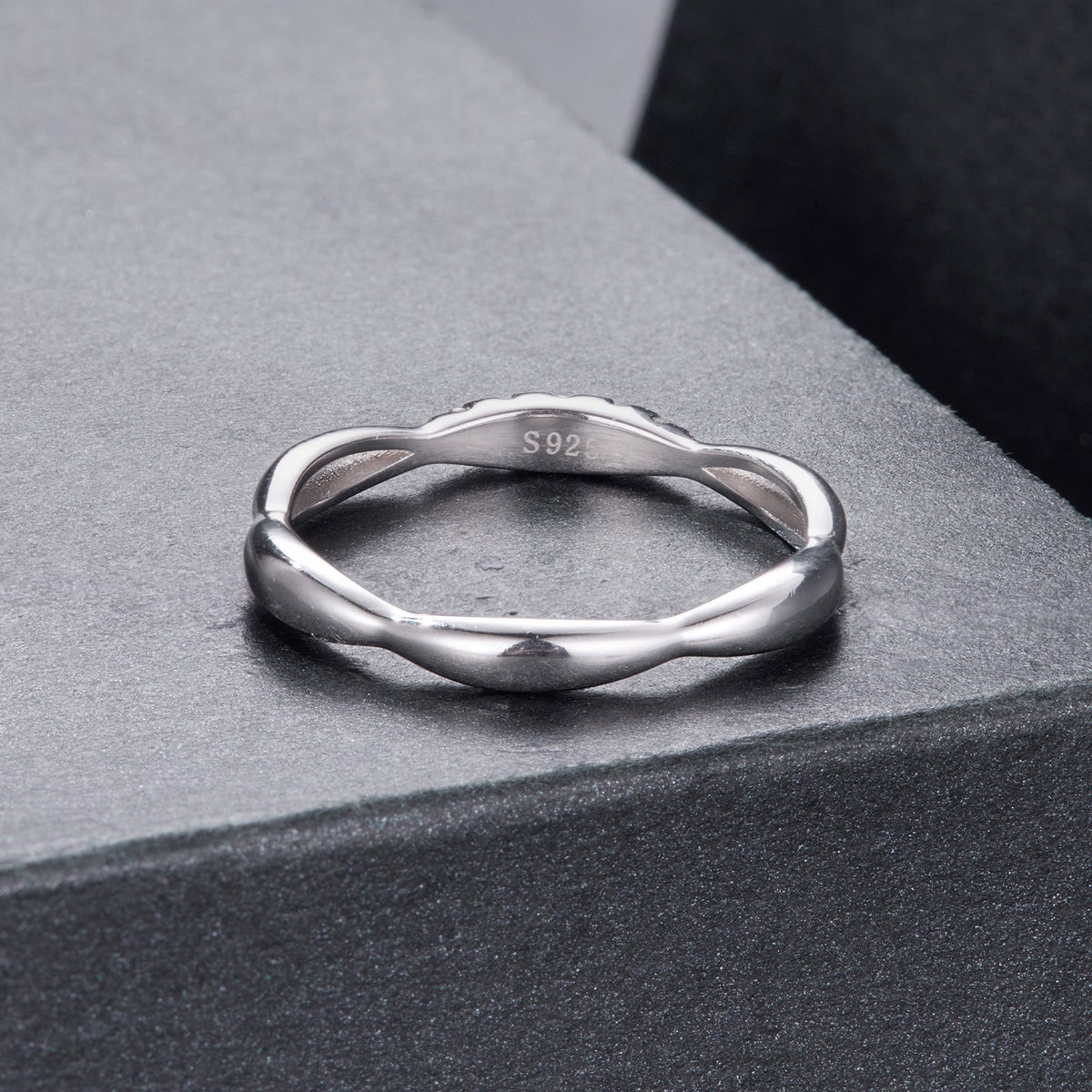 Sterling silver moissanite ring with subtle waved band and S925 stamp on Tampa Home & Garden Store