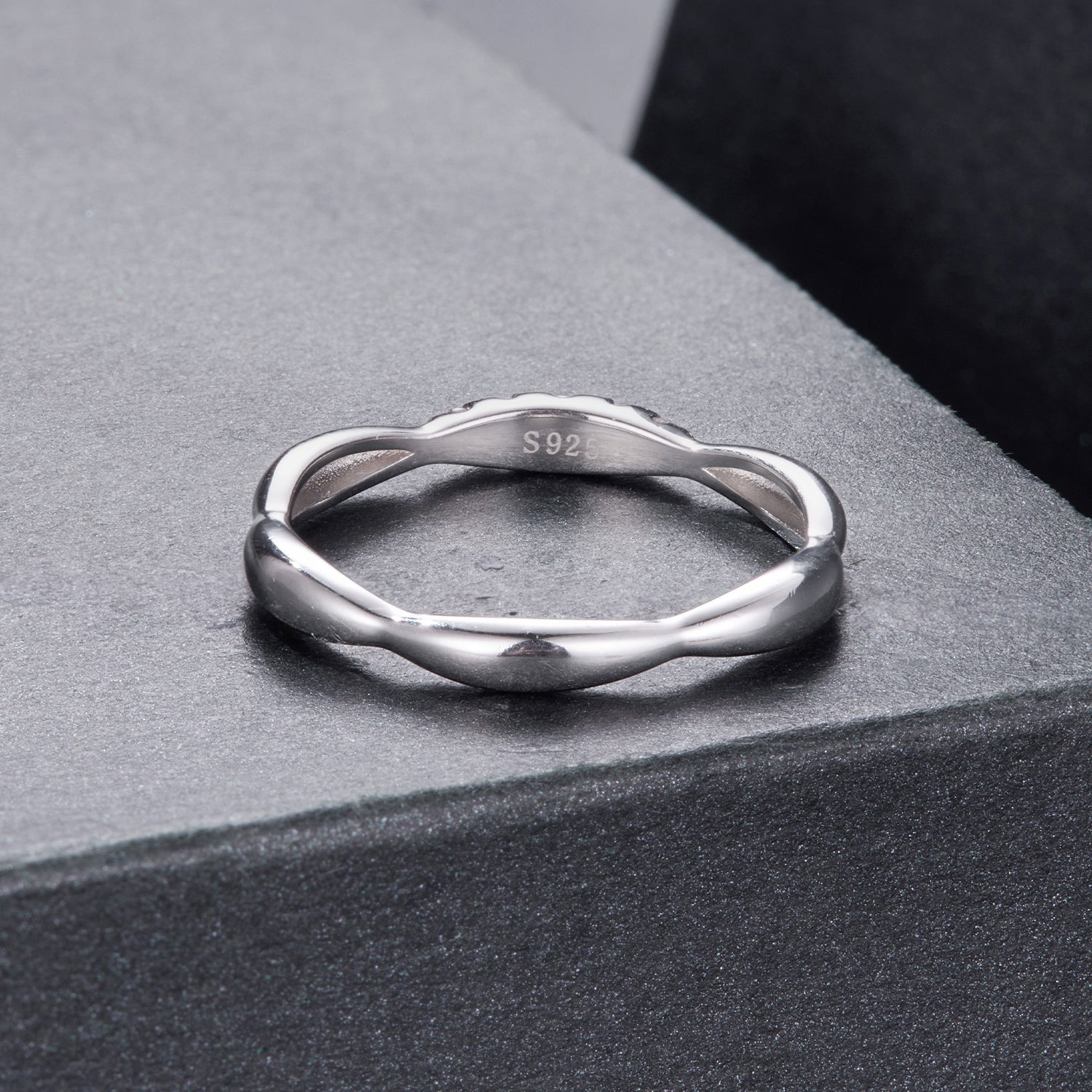 Sterling silver moissanite ring with subtle waved band and S925 stamp on Tampa Home & Garden Store