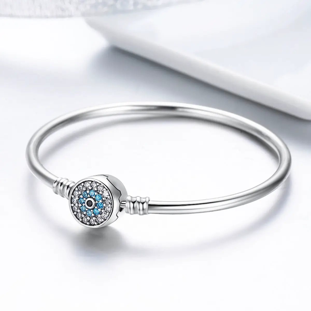 925 Sterling Silver Bracelet with circular pavé charm and blue center stones, size 17.0 on Tampa Home & Garden Store