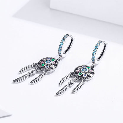 Oxidized sterling silver pavé CZ hoop earrings with blue stones and feather charms, 4x1 cm on Tampa Home & Garden Store