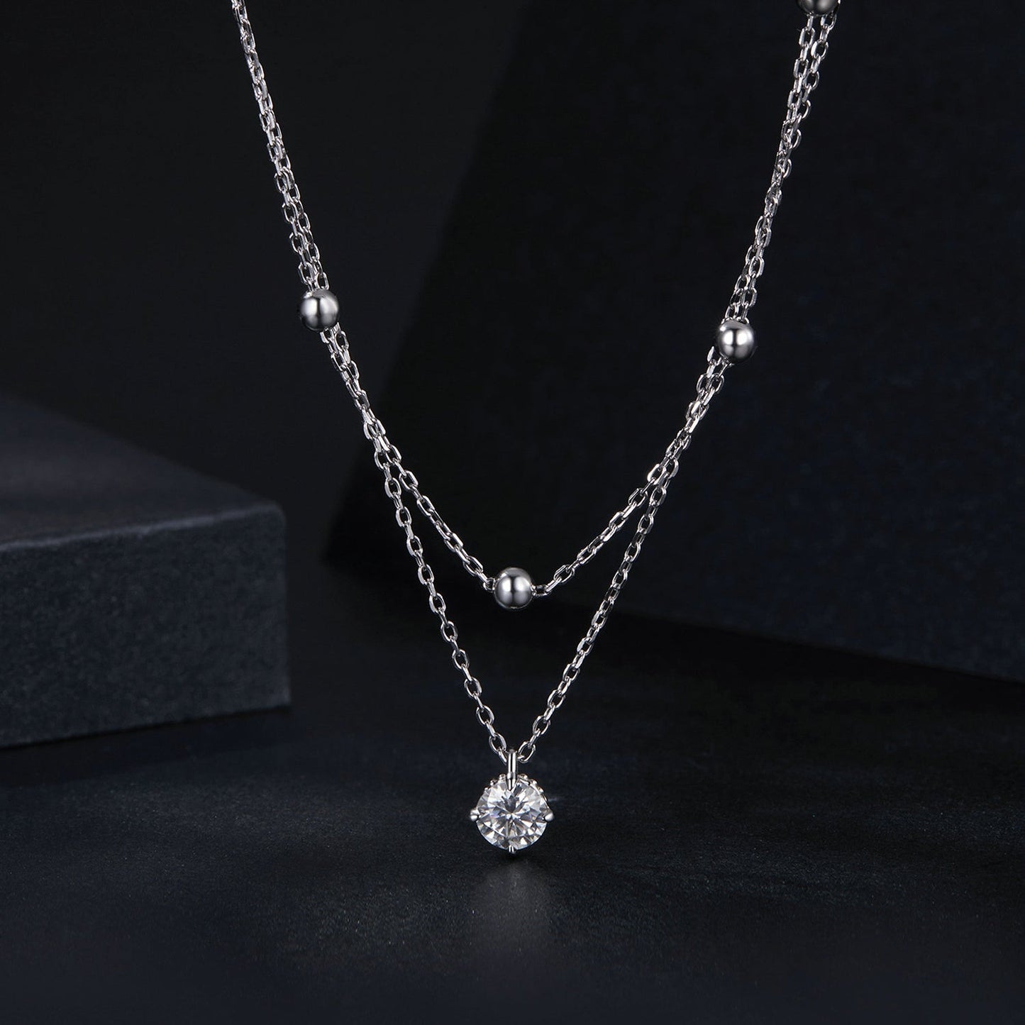 Necklace with 5.0mm moissanite pendant on platinum-plated sterling silver double chain, Bids.com on Tampa Home & Garden Store