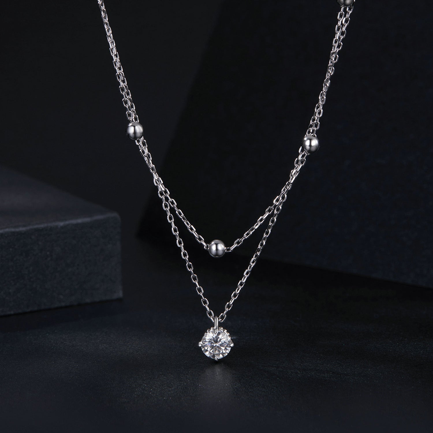 Necklace with 5.0mm moissanite pendant on platinum-plated sterling silver double chain, Bids.com on Tampa Home & Garden Store