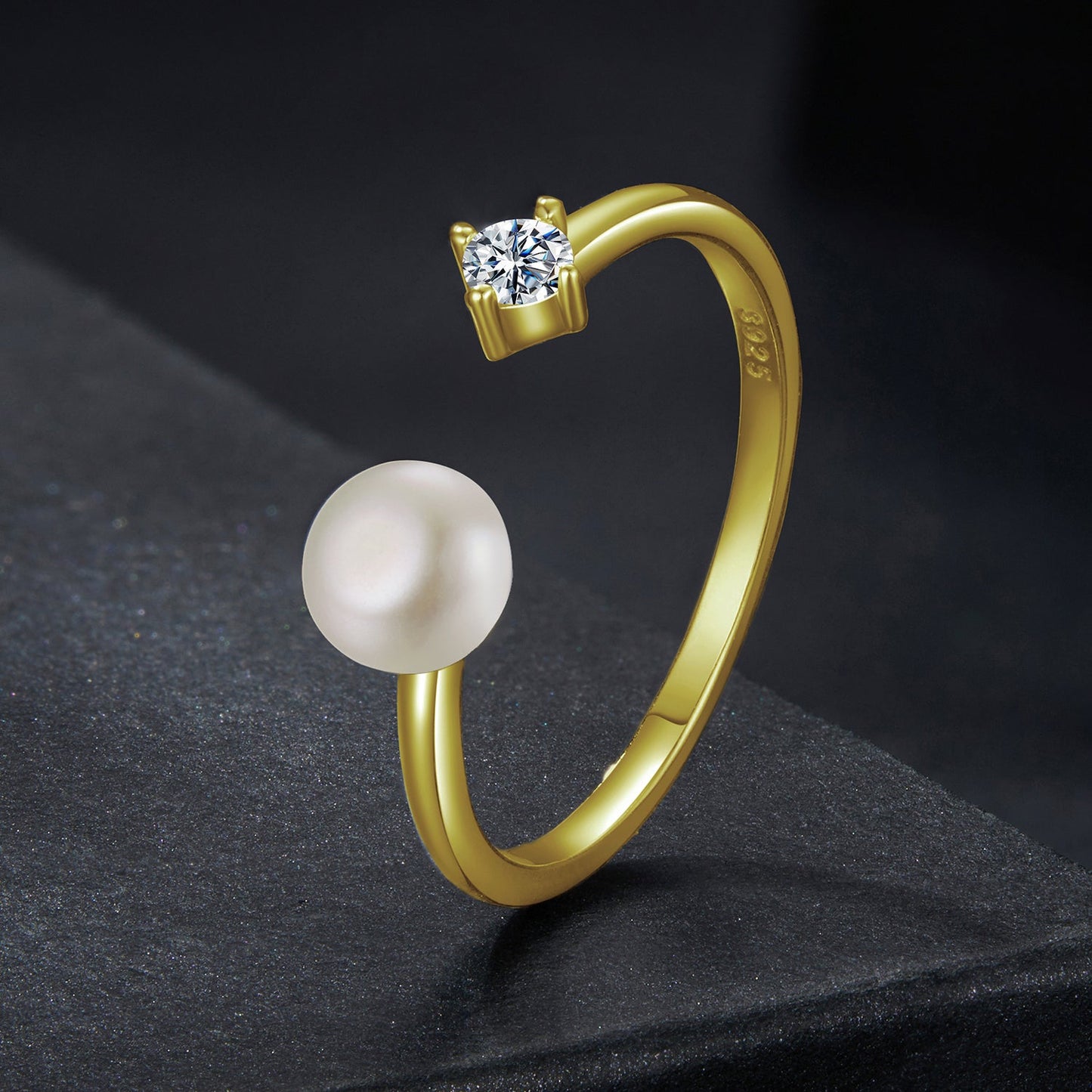 Gold-tone ring with moissanite solitaire and shell pearl accent on curved band by Bids.com on Tampa Home & Garden Store