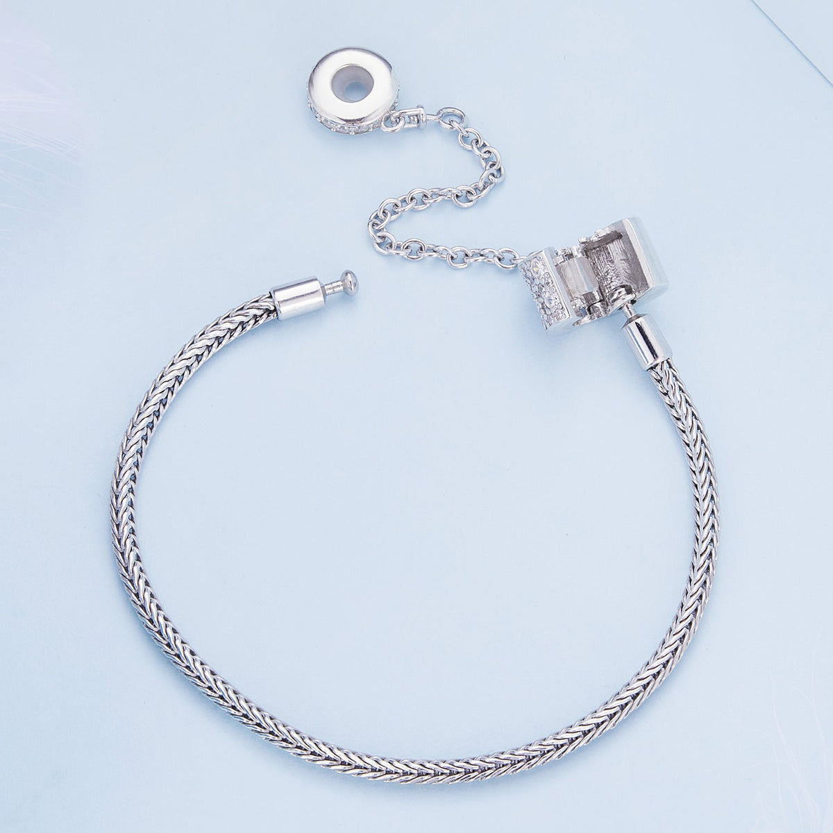 Sterling silver bracelet 17cm with pavé CZ setting, braided chain and secure clasp on Tampa Home & Garden Store
