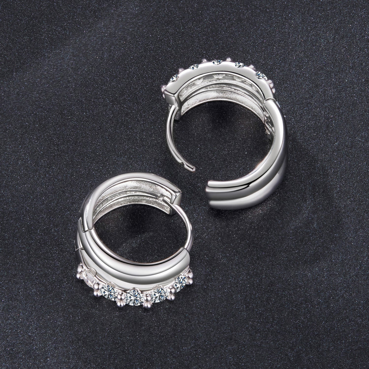 Hoop earrings in 925 sterling silver with white gold plating, moissanite stones along bottom on Tampa Home & Garden Store