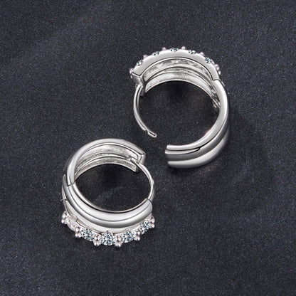 Hoop earrings in 925 sterling silver with white gold plating, moissanite stones along bottom on Tampa Home & Garden Store