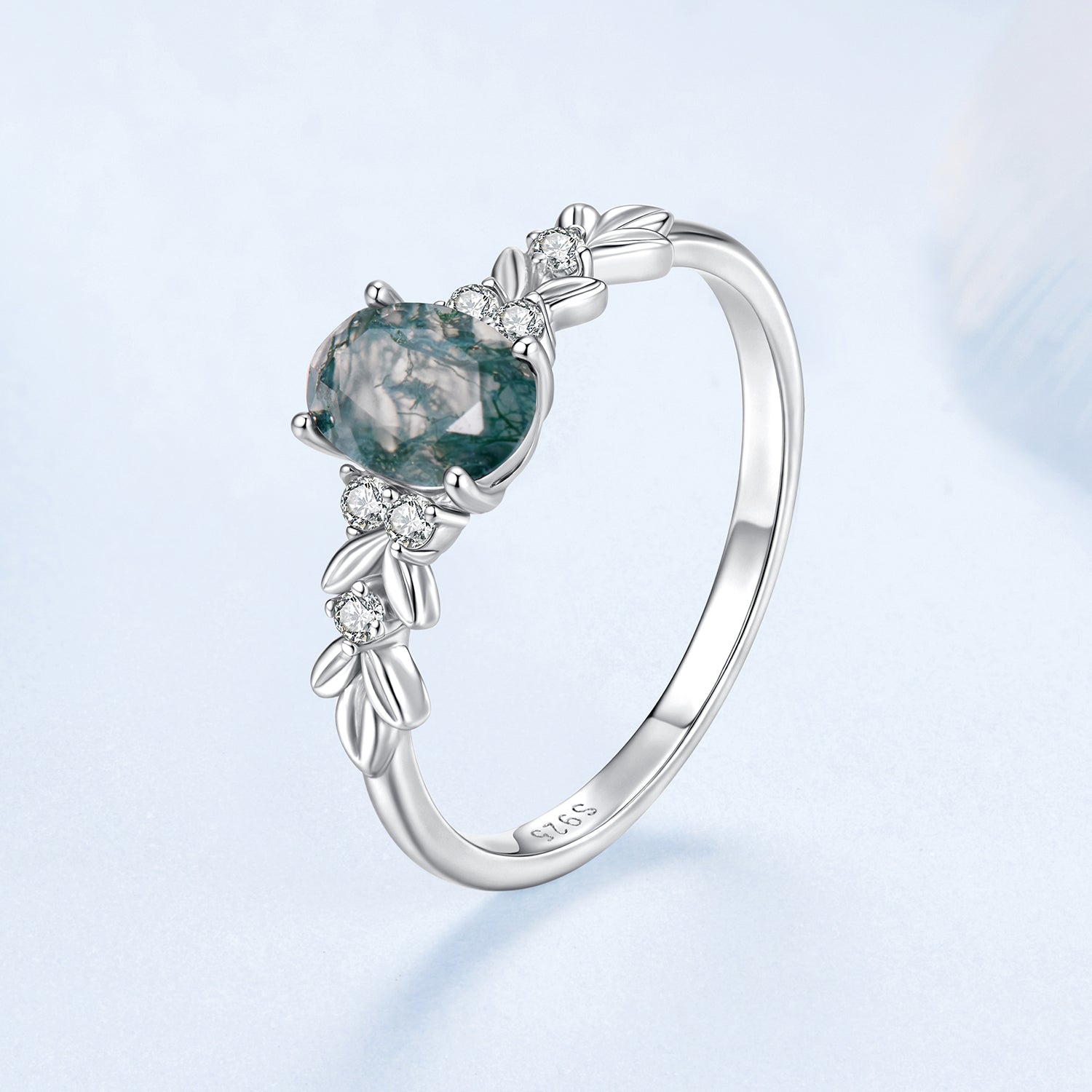 Sterling silver ring with teal agate center and CZ accents on a leaf motif band, size 6 on Tampa Home & Garden Store