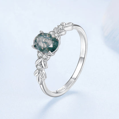 Sterling silver ring with teal agate center and CZ accents on a leaf motif band, size 6 on Tampa Home & Garden Store