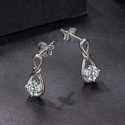 Pair of Sterling silver moissanite earrings with knot design and 0.5ct stone by Bids.com on Tampa Home & Garden Store