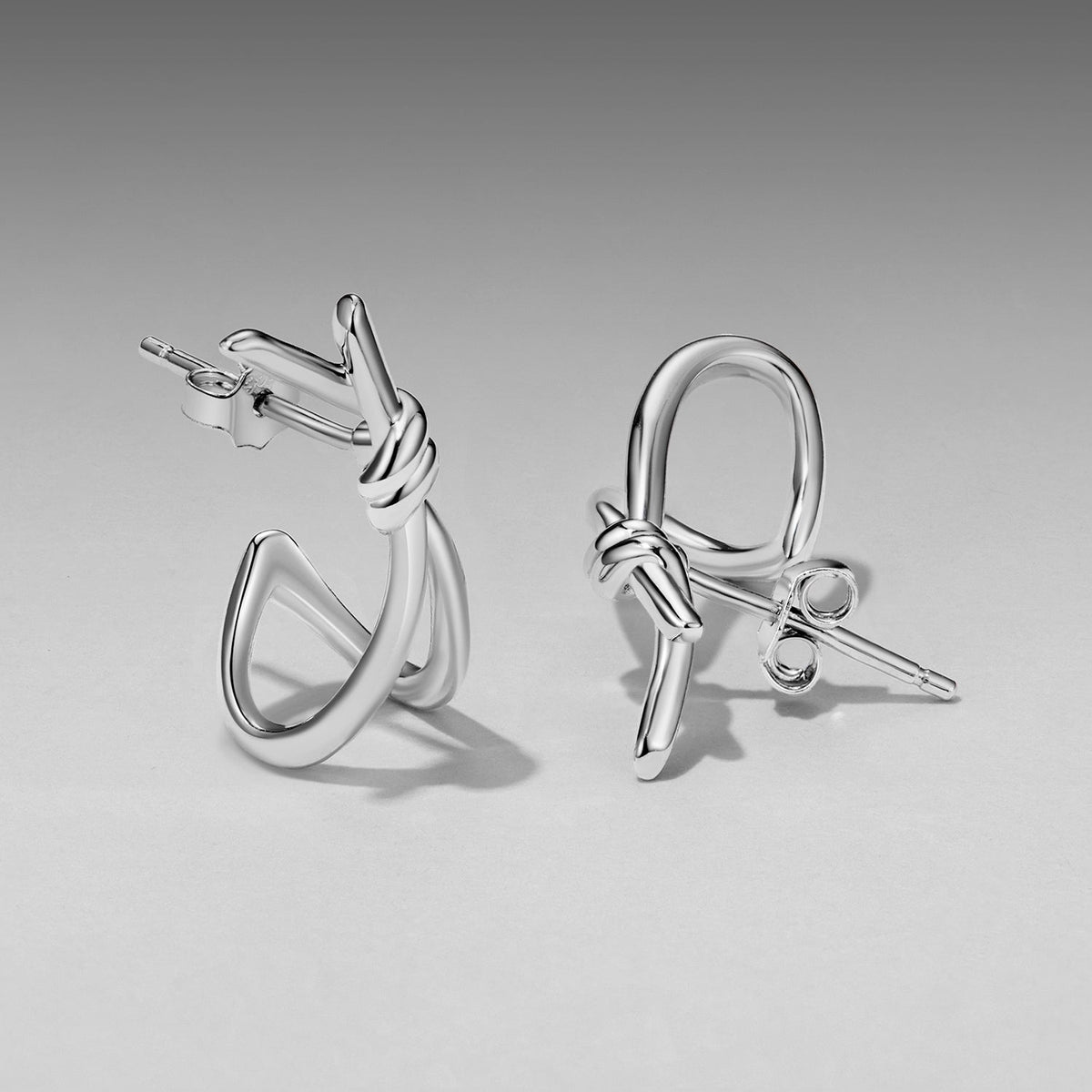 Sterling silver knot earrings for women, 2.0×0.8 cm, white gold plated, posts with butterfly backs on Tampa Home & Garden Store