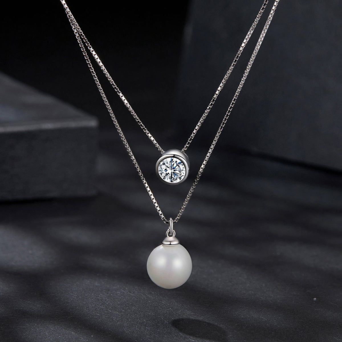 Sterling silver moissanite bezel necklace with shell pearl drop on 40+5cm gold plated chain on Tampa Home & Garden Store