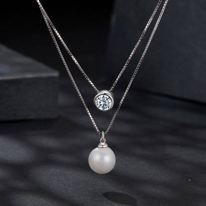 Sterling silver moissanite bezel necklace with shell pearl drop on 40+5cm gold plated chain on Tampa Home & Garden Store