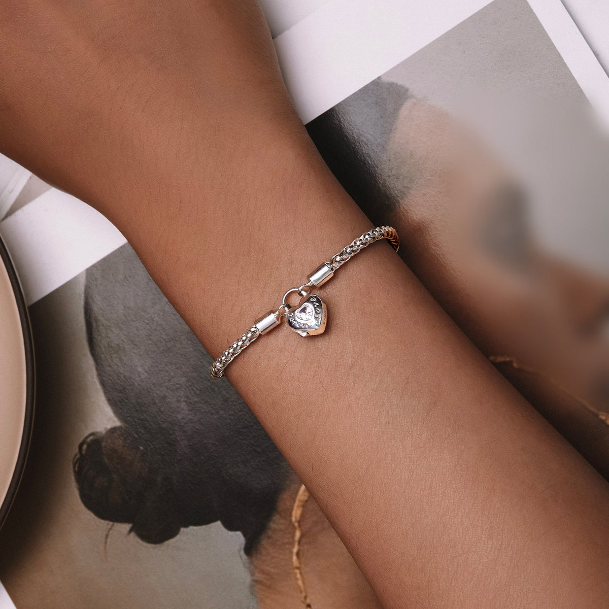 Sterling silver CZ pavé bracelet with heart charm, size 17, platinum plated, by Bids.com on Tampa Home & Garden Store