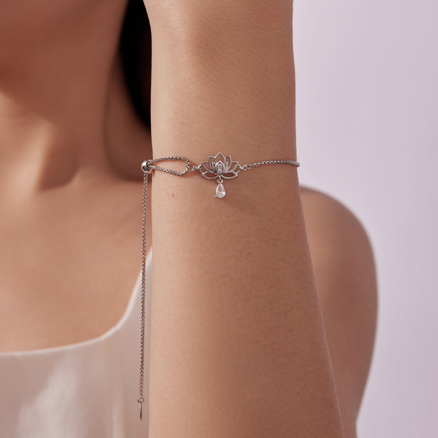 Bracelet by Bids.com, 925 sterling silver adjustable chain with lotus centerpiece and CZ on Tampa Home & Garden Store