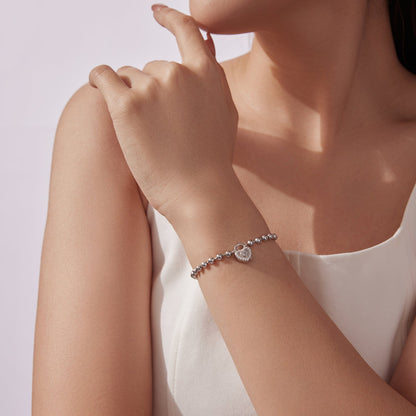 Bracelet 17cm sterling silver white gold plated with CZ pave heart charm on wrist on Tampa Home & Garden Store