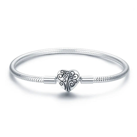 SCB 925 Bids.com sterling silver bracelet with heart charm and swirl tree motif, size 17 on Tampa Home & Garden Store