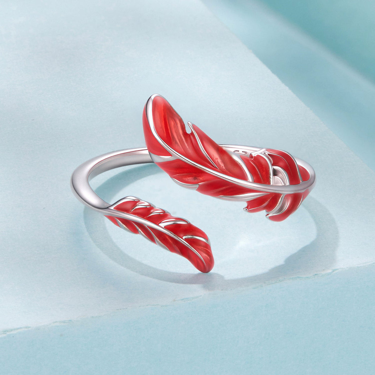 Sterling silver ring with white gold plating and red enamel leaf accents on Tampa Home & Garden Store