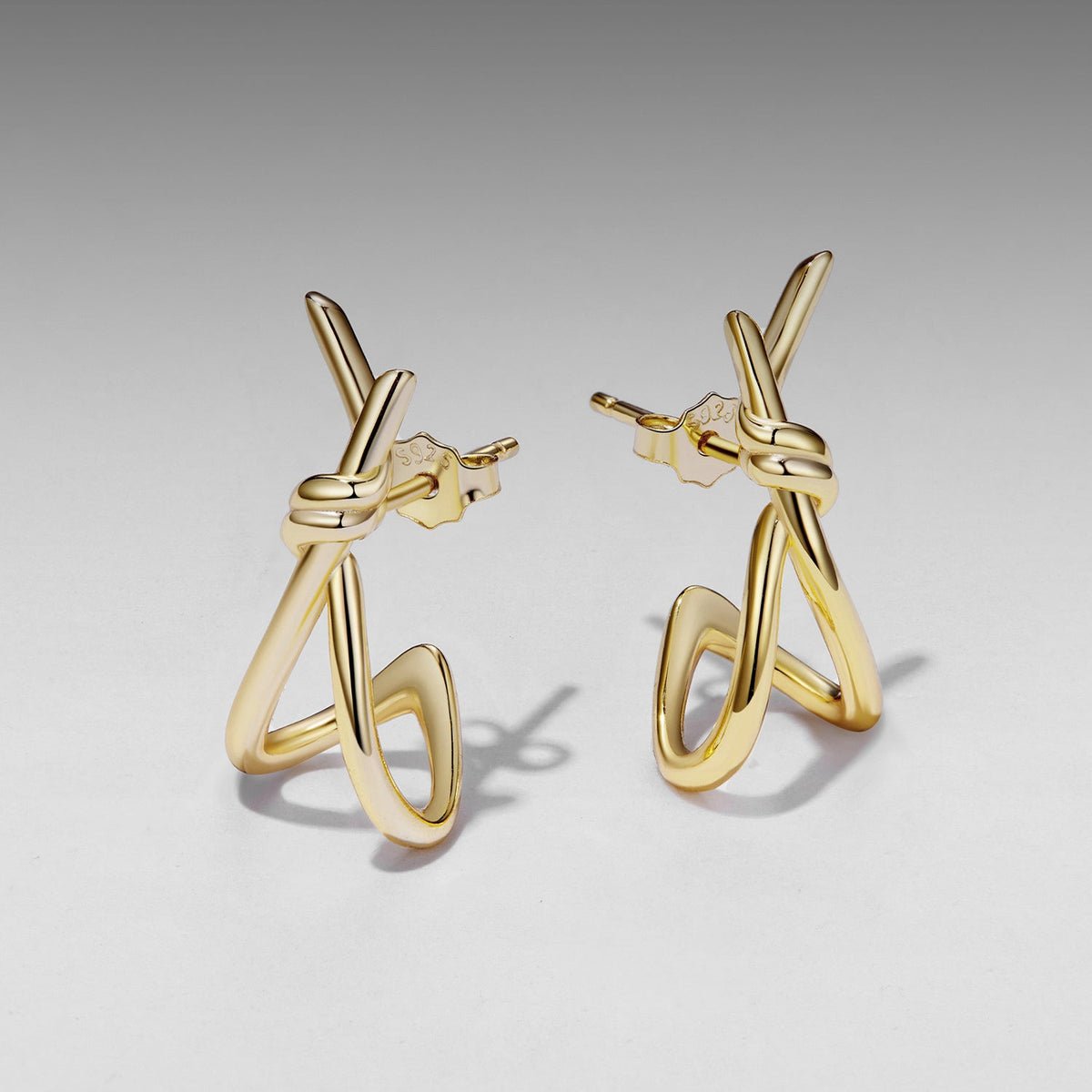 Gold-tone knot earrings, 2 pcs, 925 sterling silver plated white gold, Bids.com on Tampa Home & Garden Store