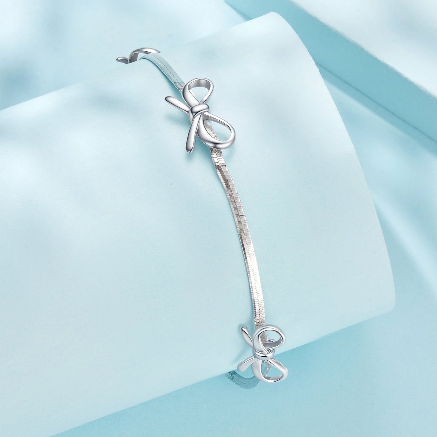 Bracelet 925 sterling silver with white gold plating, adjustable snake-chain, silver bow charm on Tampa Home & Garden Store