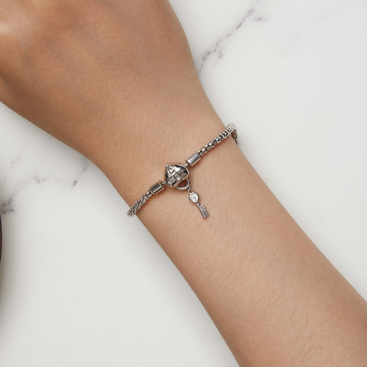 Sterling silver pavé CZ bracelet size 17 for women by Bids.com with key charm on Tampa Home & Garden Store