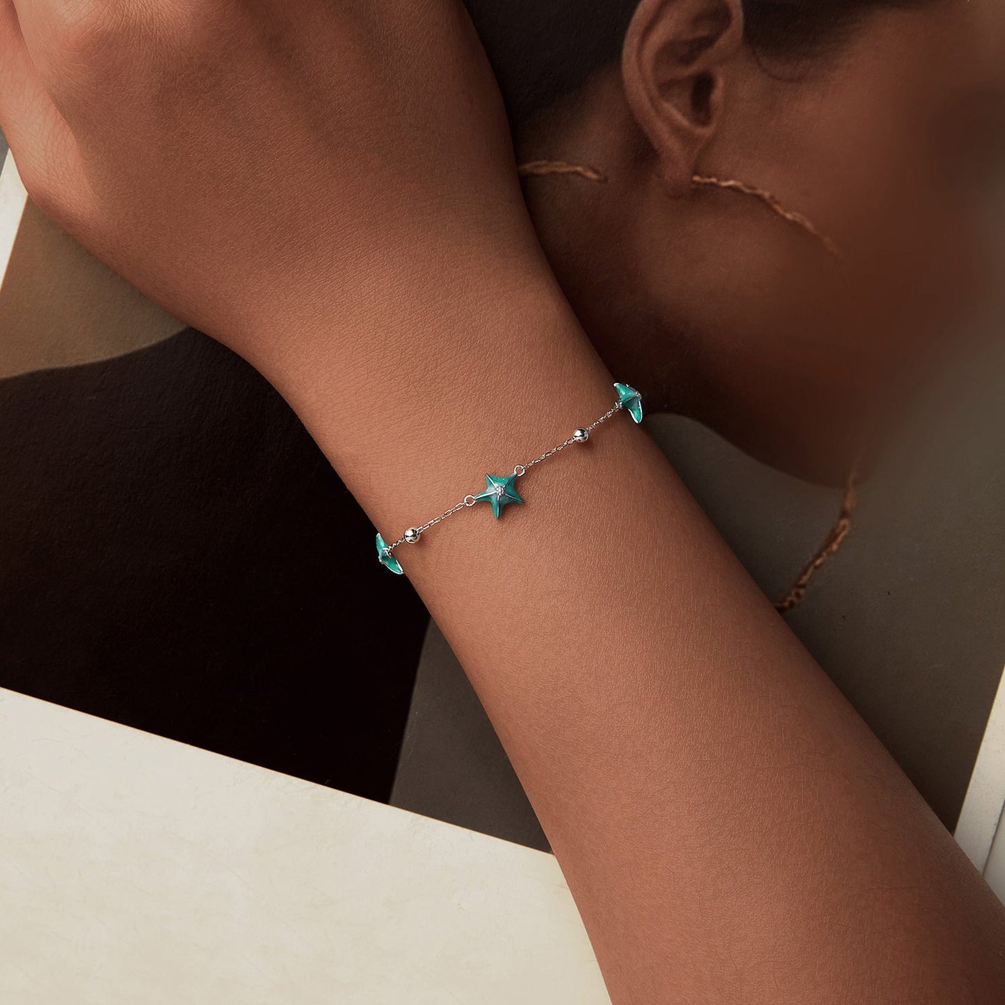 Bracelet: 925 Sterling Silver Starfish Design with turquoise enamel charms on Tampa Home & Garden Store