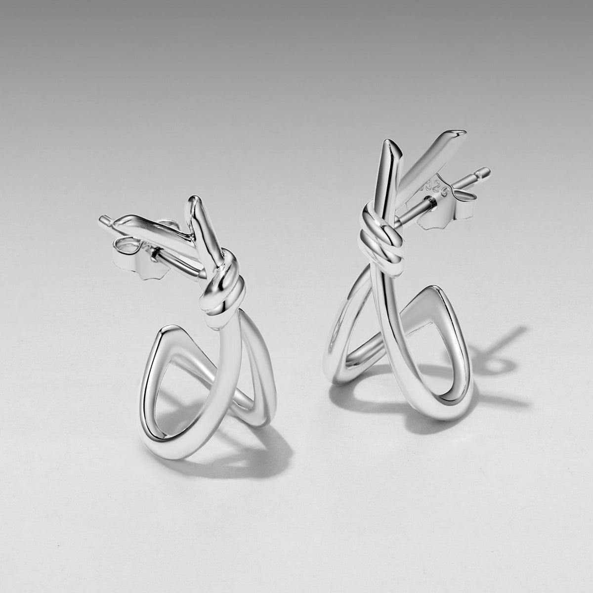 Pair of 925 sterling silver knotted hoop earrings, white gold plated, size 2.0x0.8 cm, Bids.com on Tampa Home & Garden Store