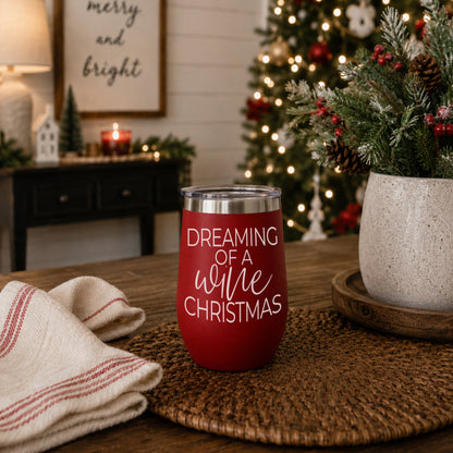 Gia Roma 17oz red tumbler with white Dreaming of a Wine Christmas script on a festive setting on Tampa Home & Garden Store