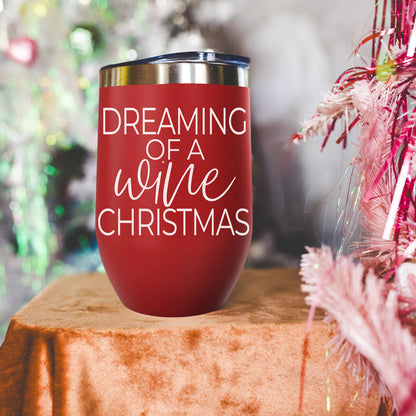 Gia Roma 17oz red tumbler with script Dreaming of a wine Christmas, metal lid on table on Tampa Home & Garden Store
