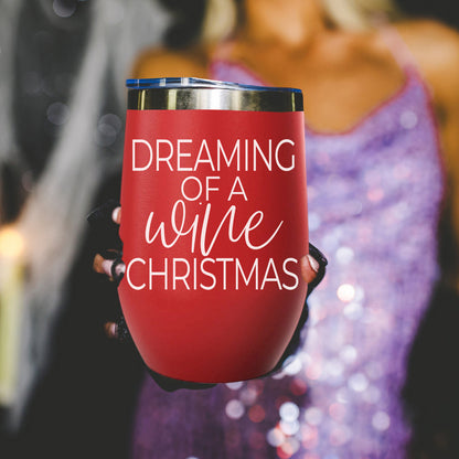 Gia Roma 17oz red tumbler with white script Dreaming of a Wife Christmas held by gloved hands on Tampa Home & Garden Store