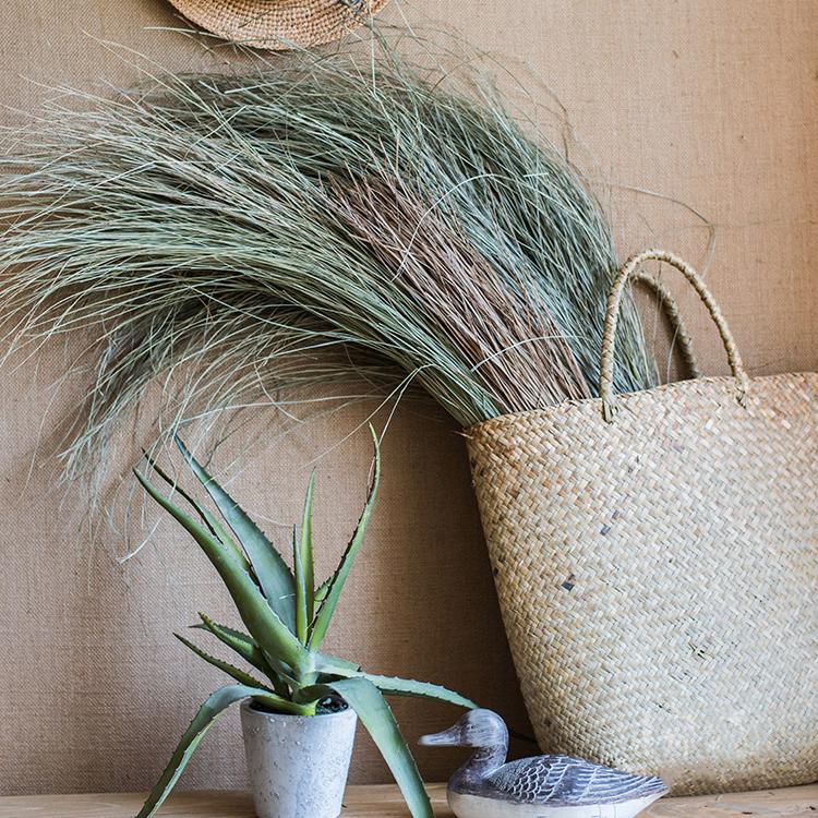 Artificial Faux Dried Grass Bundle by RusticReach in a blue-green, natural woven basket on Tampa Home & Garden Store
