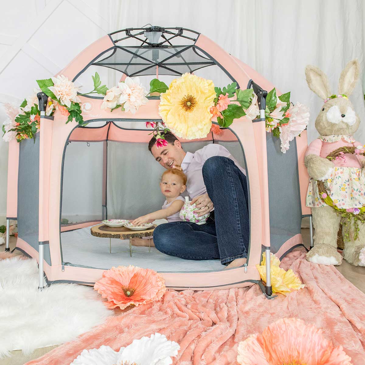 Pop 'N Go Playpen pink play yard with gray mesh panels and floral garland decor on Tampa Home & Garden Store