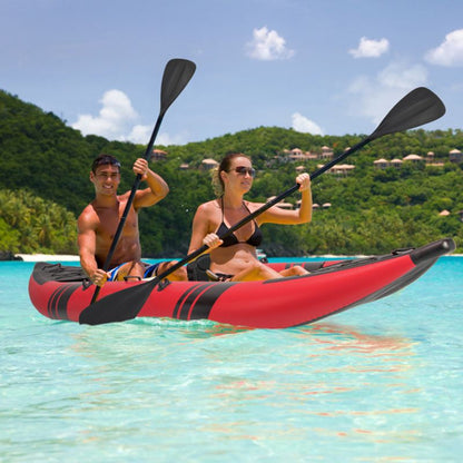 Inflatable 2-person kayak by Mercantile Mountain aluminium oars red with black accents on water on Tampa Home & Garden Store