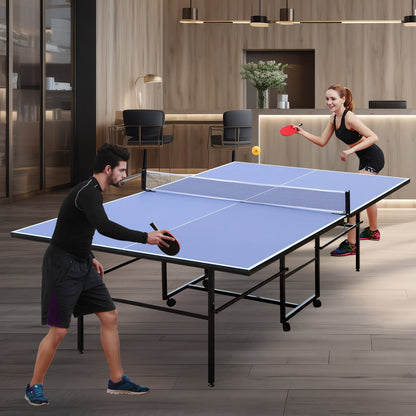 9-Foot Foldable Indoor Ping Pong Table Set with Accessories blue surface; two players indoors on Tampa Home & Garden Store