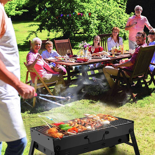 Portable charcoal grill on foldable legs grilling skewers and veggies at a sunny backyard gathering on Tampa Home & Garden Store