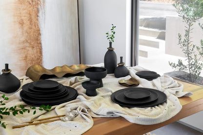 Kodo 4pc Place Setting plates in black matte ceramic by dumæ dinnerware set on beige linen cloth on Tampa Home & Garden Store