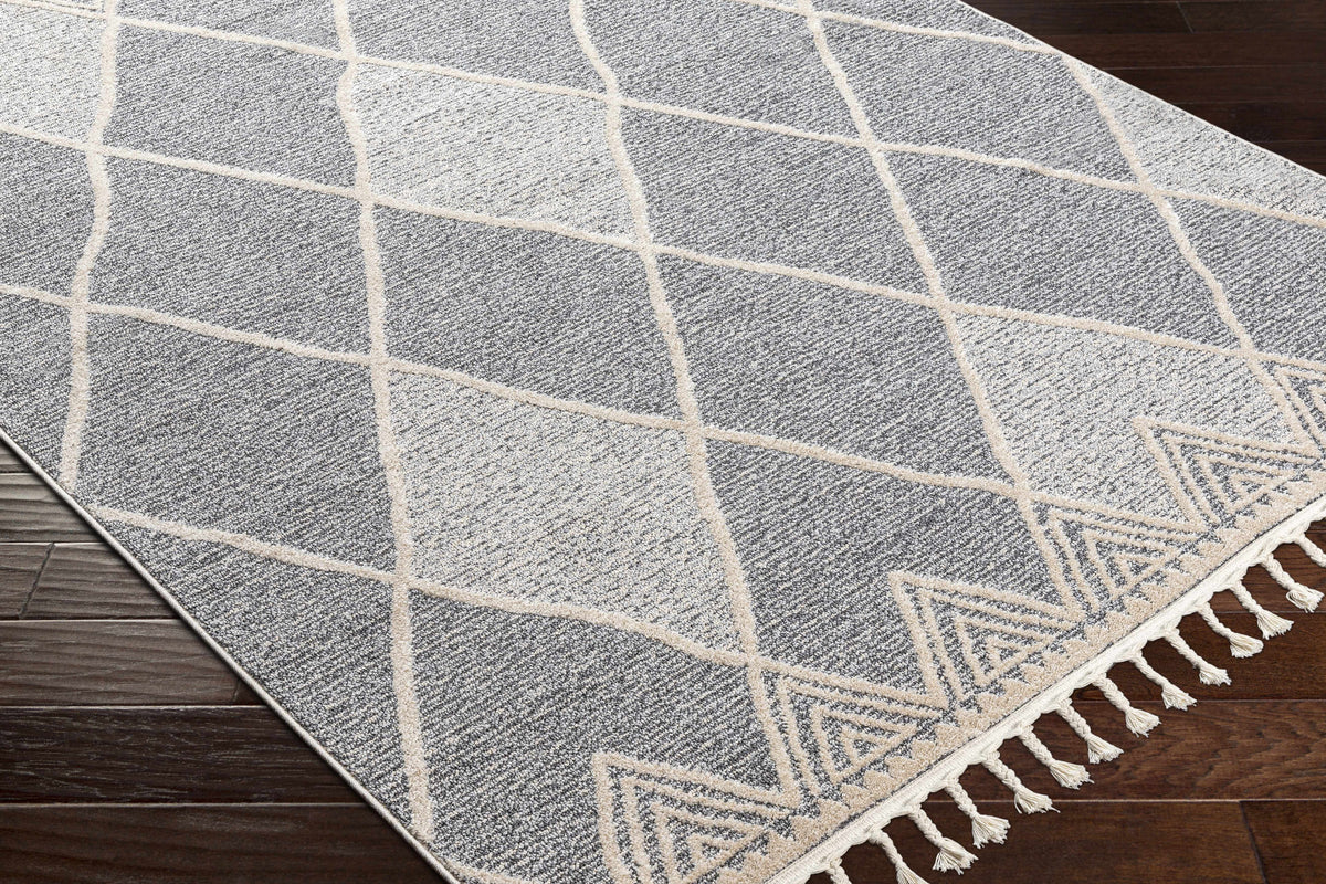 Dumlan Area Carpet rug with gray and cream geometric lines and fringed edges on Tampa Home & Garden Store