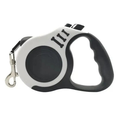 Stevvex retractable dog leash with white and black housing ergonomic grip and metal clip on Tampa Home & Garden Store